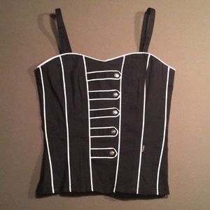 Black corset with white piping
